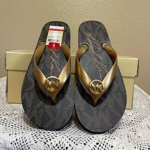 Sold - Michael Kors Black and Gold Flip Flops. Brand New.